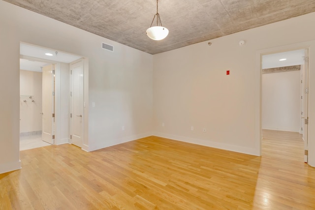 417 Frazier Ave Unit 404, Chattanooga, TN 37405 - unfurnished room with light wood-style flooring and baseboards