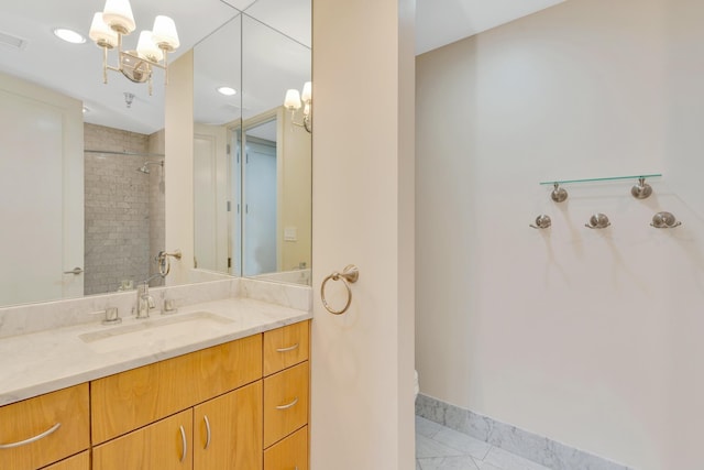417 Frazier Ave Unit 404, Chattanooga, TN 37405 - full bath with vanity, tiled shower, and a chandelier