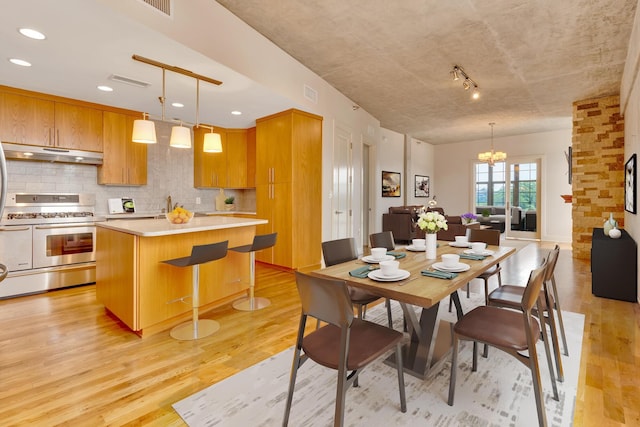 417 Frazier Ave Unit 404, Chattanooga, TN 37405 - dining area with a chandelier, light wood finished floors, and recessed lighting