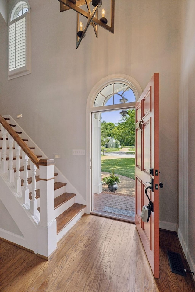 103 Wellesley Pl, Columbia, TN 38401 - entryway with stairs, a chandelier, and light wood-type flooring