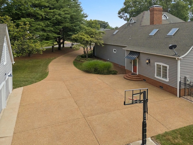 103 Wellesley Pl, Columbia, TN 38401 - back of property with a shingled roof, a chimney, a patio area, crawl space, and entry steps