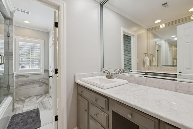 103 Wellesley Pl, Columbia, TN 38401 - bathroom featuring vanity, ornamental molding, recessed lighting, and marble finish flooring