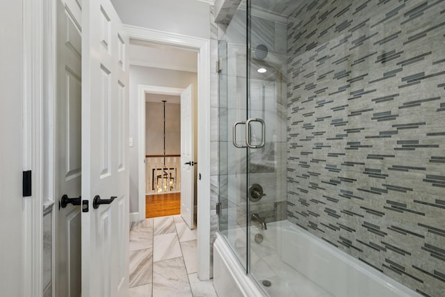 103 Wellesley Pl, Columbia, TN 38401 - bathroom featuring combined bath / shower with glass door, marble finish floors, and ornamental molding