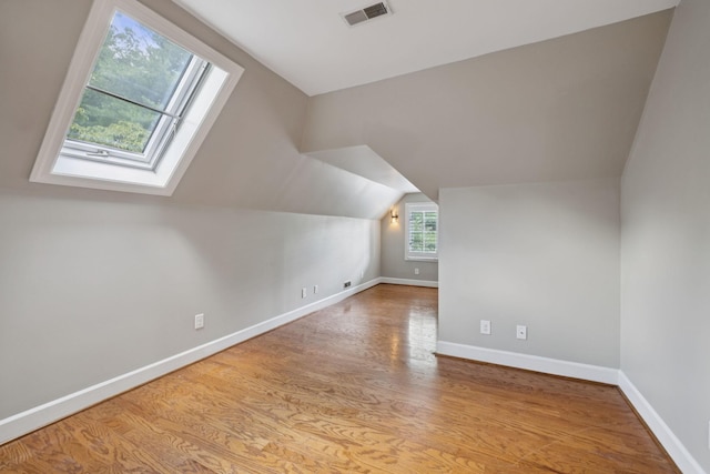 103 Wellesley Pl, Columbia, TN 38401 - bonus room with wood finished floors, vaulted ceiling, and a skylight