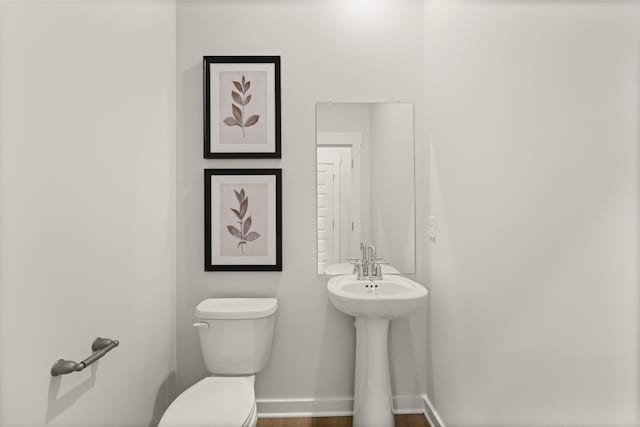 2453 Williams Ridge Dr, Columbia, TN 38401 - half bathroom featuring toilet and wood finished floors