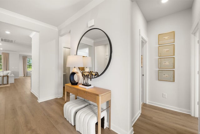 2453 Williams Ridge Dr, Columbia, TN 38401 - hallway featuring wood finished floors, recessed lighting, and crown molding