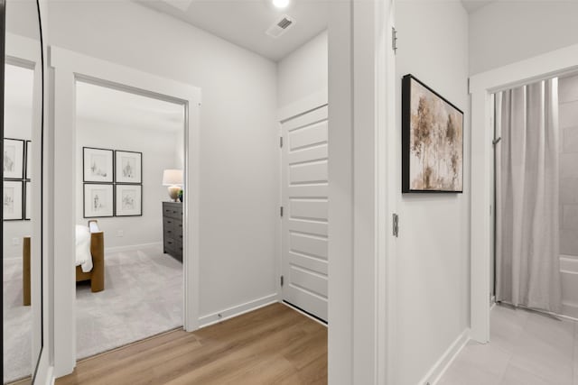 2453 Williams Ridge Dr, Columbia, TN 38401 - hallway featuring baseboards and light wood finished floors
