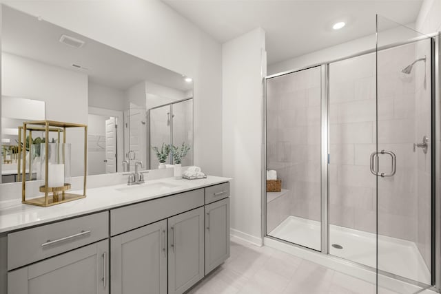 2453 Williams Ridge Dr, Columbia, TN 38401 - full bath with vanity, a stall shower, a walk in closet, recessed lighting, and tile patterned flooring