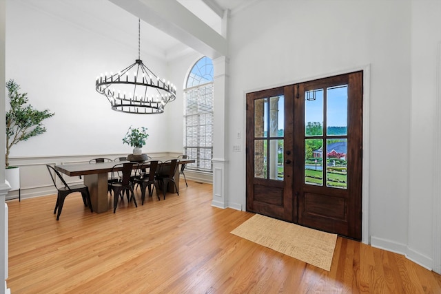 9401 Lazy Circles Dr, Ooltewah, TN 37363 - entryway with a chandelier and light wood-style floors