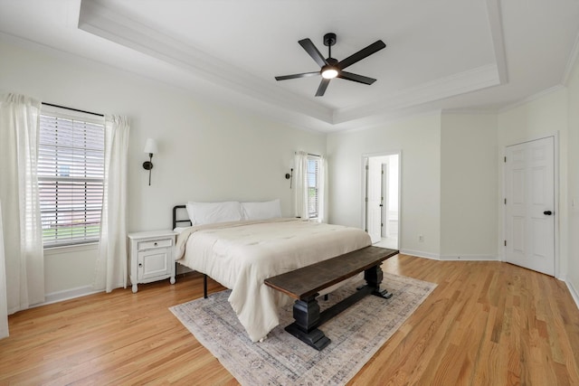 9401 Lazy Circles Dr, Ooltewah, TN 37363 - bedroom with a raised ceiling, crown molding, light wood-style floors, and ceiling fan