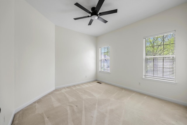 9401 Lazy Circles Dr, Ooltewah, TN 37363 - spare room featuring light carpet and a ceiling fan