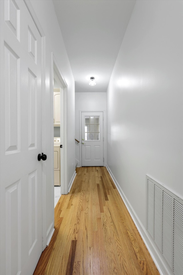 9401 Lazy Circles Dr, Ooltewah, TN 37363 - hallway featuring washer / clothes dryer and light wood finished floors