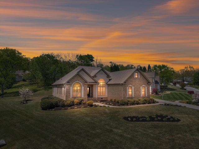 9401 Lazy Circles Dr, Ooltewah, TN 37363 - view of front of property featuring a front yard and brick siding