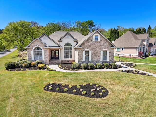 9401 Lazy Circles Dr, Ooltewah, TN 37363 - view of front of property with a front lawn and brick siding