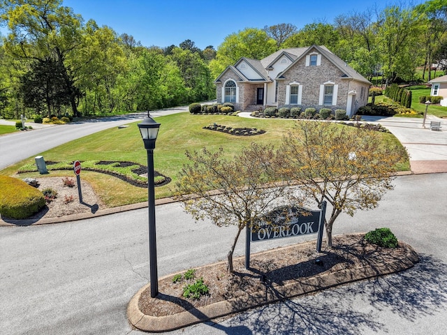 9401 Lazy Circles Dr, Ooltewah, TN 37363 - view of front of home with a front yard