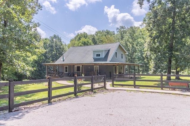 539 Bland Hollow Rd, Hohenwald, TN 38462 - farmhouse-style home with an exterior structure