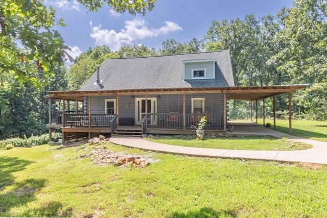 539 Bland Hollow Rd, Hohenwald, TN 38462 - view of front of home featuring a front lawn, a carport, and a wooden deck