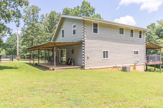 539 Bland Hollow Rd, Hohenwald, TN 38462 - view of property exterior featuring a lawn, a patio area, log exterior, and a deck