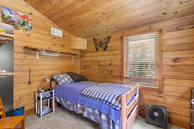 539 Bland Hollow Rd, Hohenwald, TN 38462 - carpeted bedroom with vaulted ceiling, wooden walls, and wooden ceiling