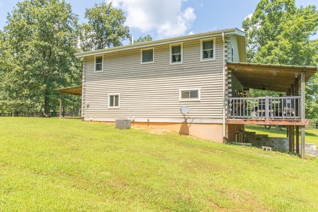 539 Bland Hollow Rd, Hohenwald, TN 38462 - back of house with a lawn and log siding