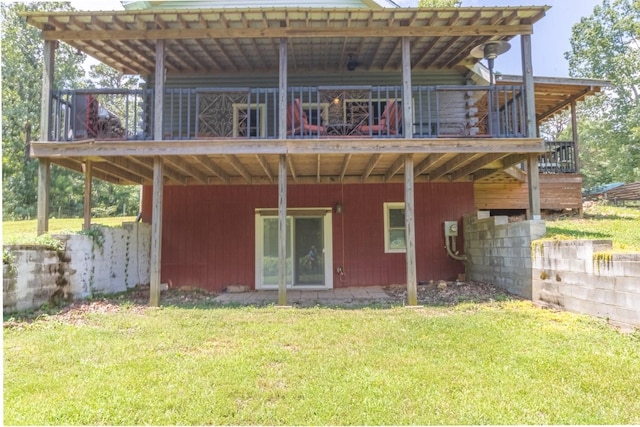 539 Bland Hollow Rd, Hohenwald, TN 38462 - back of house with a lawn and a wooden deck