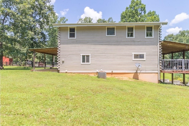 539 Bland Hollow Rd, Hohenwald, TN 38462 - view of home's exterior featuring a yard, log exterior, and a deck