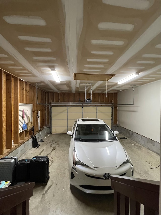 1253 Annapolis Cir, Thompsons Station, TN 37179 - garage featuring a garage door opener