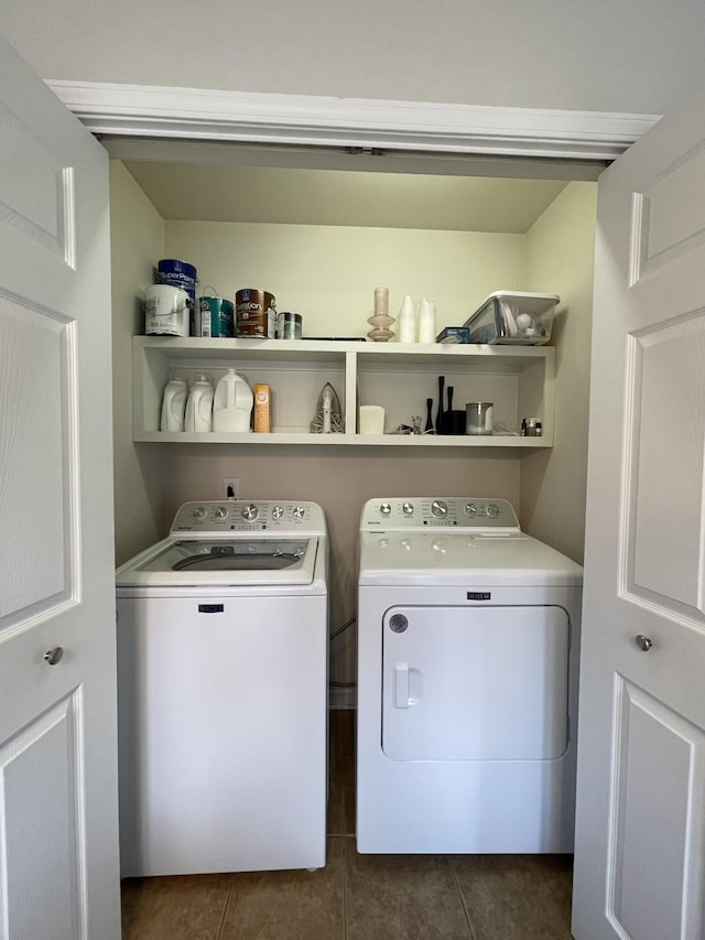 1253 Annapolis Cir, Thompsons Station, TN 37179 - washroom with washer and dryer and dark tile patterned flooring