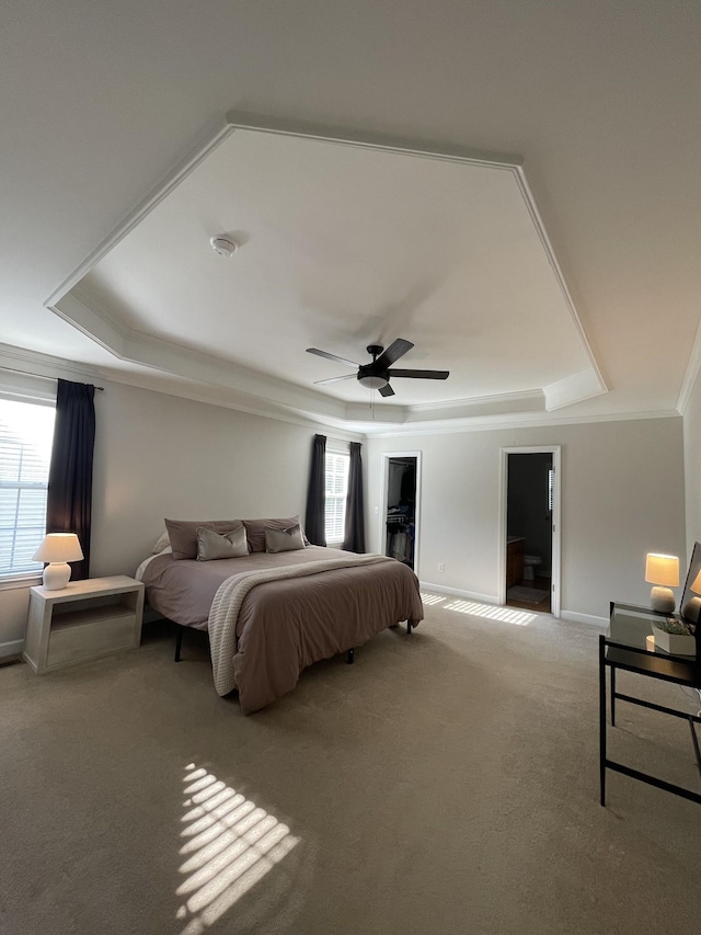 1253 Annapolis Cir, Thompsons Station, TN 37179 - bedroom featuring a tray ceiling, crown molding, carpet flooring, and ceiling fan