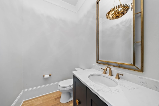6004 Pelican Way, College Grove, TN 37046 - half bathroom with vanity, wood finished floors, and ornamental molding