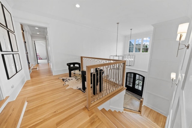 6004 Pelican Way, College Grove, TN 37046 - hall with light wood-type flooring, a chandelier, recessed lighting, and an upstairs landing