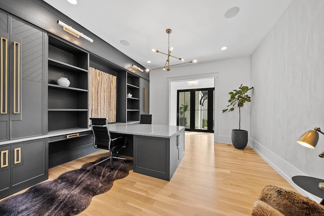 6004 Pelican Way, College Grove, TN 37046 - home office with built in study area, light wood-style floors, a chandelier, built in shelves, and recessed lighting
