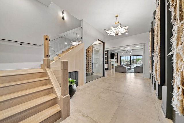 6004 Pelican Way, College Grove, TN 37046 - foyer featuring stairs and a chandelier