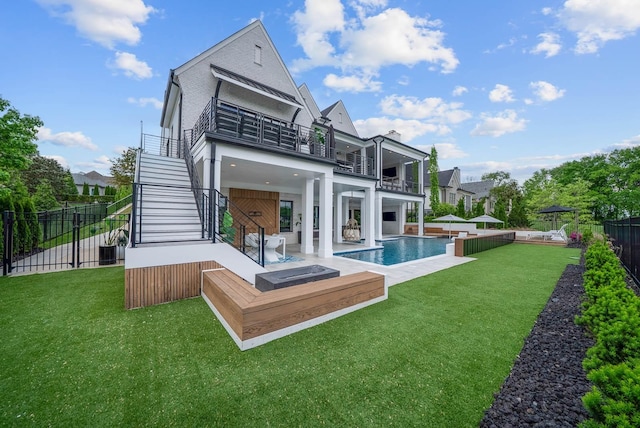6004 Pelican Way, College Grove, TN 37046 - back of property with a balcony, a fenced backyard, stairway, and a patio area