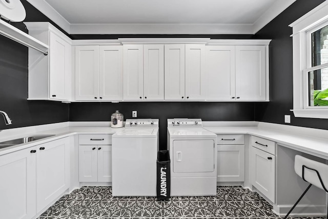 6004 Pelican Way, College Grove, TN 37046 - laundry room featuring cabinet space, washing machine and clothes dryer, and crown molding