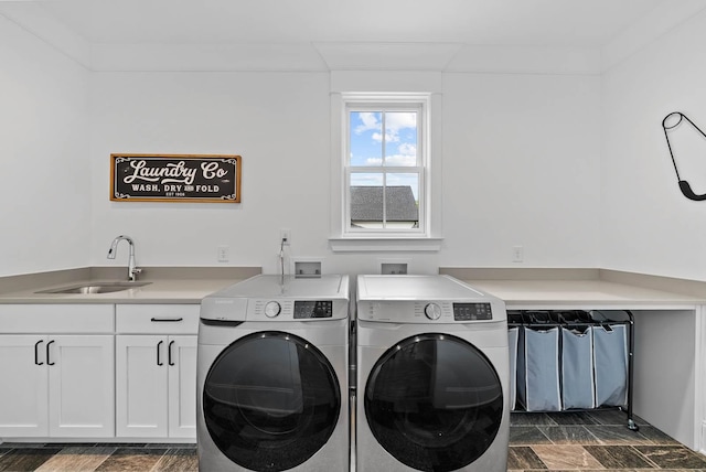 6004 Pelican Way, College Grove, TN 37046 - laundry room featuring washer and dryer, stone finish floors, and cabinet space