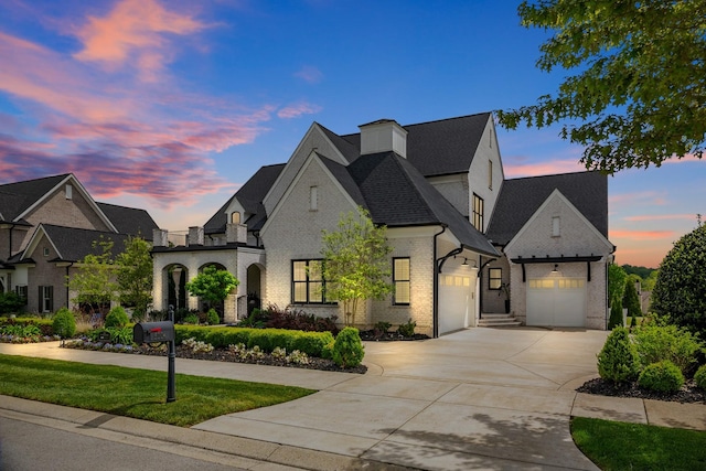 6004 Pelican Way, College Grove, TN 37046 - french country style house featuring driveway, brick siding, a garage, and a shingled roof