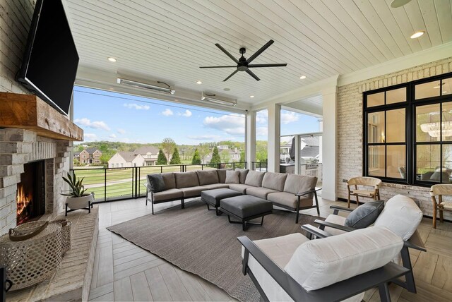 6004 Pelican Way, College Grove, TN 37046 - wooden terrace featuring an outdoor living space with a fireplace, a ceiling fan, and a residential view