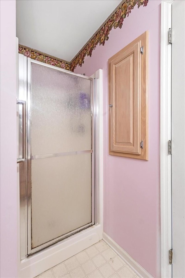 161 Cumberland Oaks Dr, Tullahoma, TN 37388 - bathroom with a stall shower and baseboards