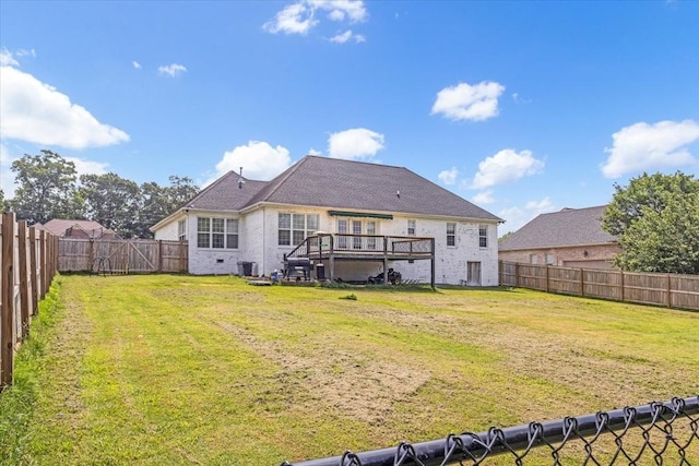 161 Cumberland Oaks Dr, Tullahoma, TN 37388 - back of property featuring a fenced backyard and a wooden deck