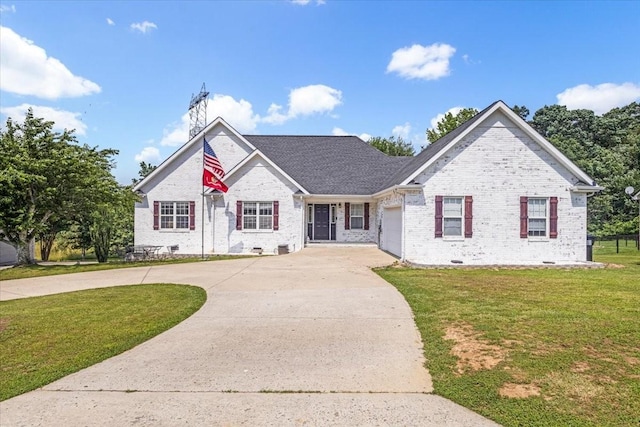161 Cumberland Oaks Dr, Tullahoma, TN 37388 - view of front of home featuring curved driveway, a front yard, and brick siding
