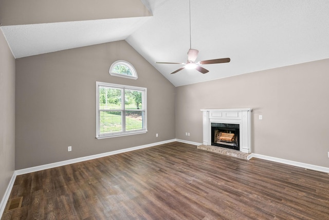 1155 Delmont Church Rd, Cadiz, KY 42211 - unfurnished living room with a ceiling fan, lofted ceiling, dark wood finished floors, and a fireplace with raised hearth