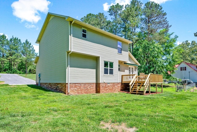 1155 Delmont Church Rd, Cadiz, KY 42211 - rear view of house with a deck and a lawn