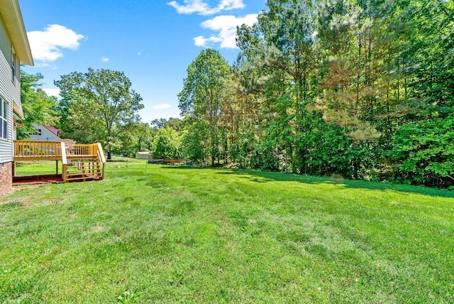 1155 Delmont Church Rd, Cadiz, KY 42211 - view of green lawn featuring a deck