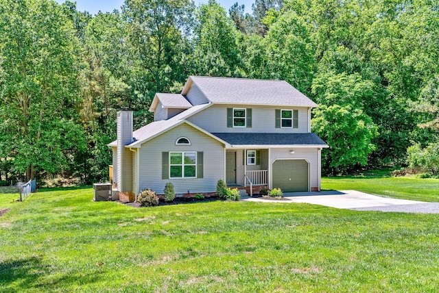 1155 Delmont Church Rd, Cadiz, KY 42211 - view of front facade with a chimney, an attached garage, driveway, and a front yard