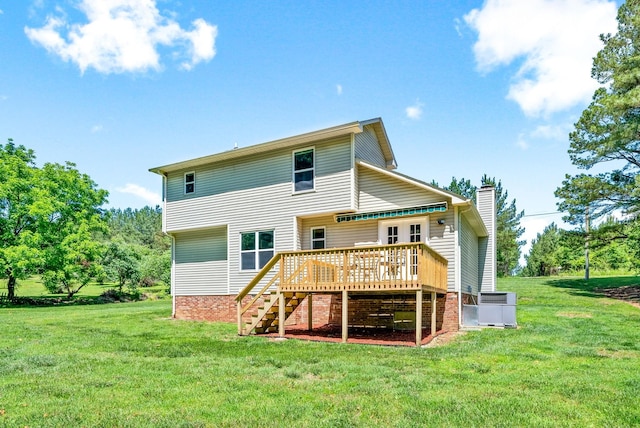 1155 Delmont Church Rd, Cadiz, KY 42211 - rear view of house featuring a wooden deck, a yard, a chimney, and stairway