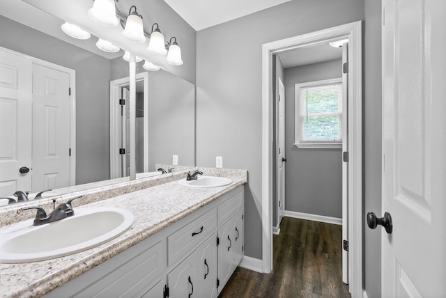 1155 Delmont Church Rd, Cadiz, KY 42211 - full bath with double vanity and wood finished floors