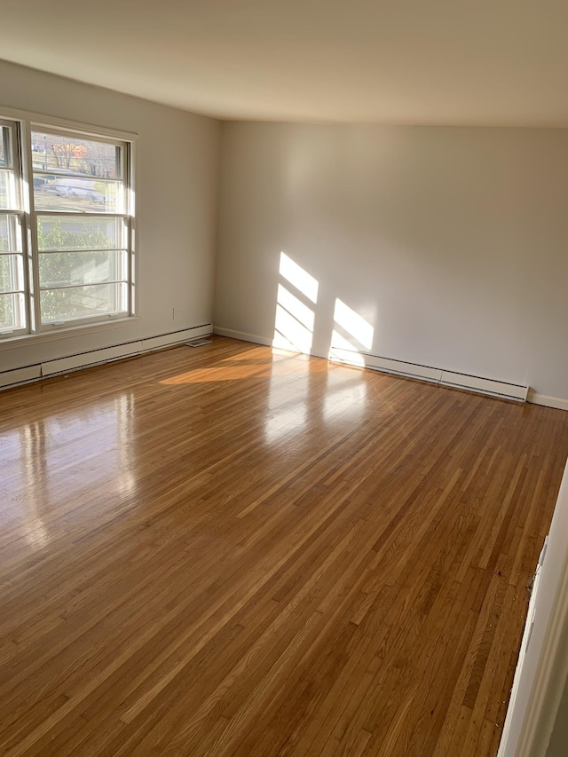 1206 Park Mere Dr, Columbia, TN 38401 - empty room with baseboard heating and wood finished floors