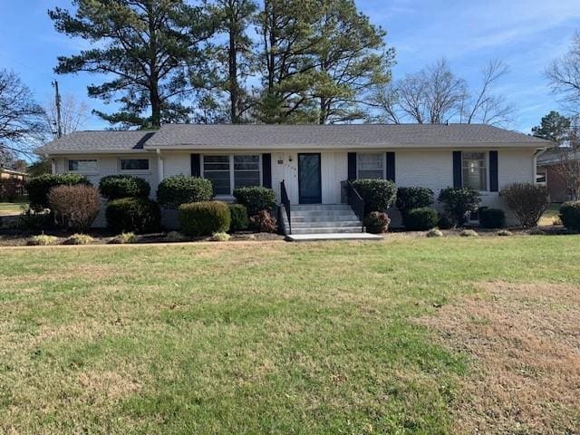 1206 Park Mere Dr, Columbia, TN 38401 - ranch-style home with a front lawn and brick siding