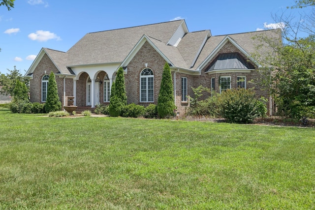 6913 Zion Crossing Ct, Columbia, TN 38401 - view of front of property featuring brick siding, a front yard, and a shingled roof